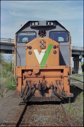 179-29
Gheringhap, Siding C, V/Line broad gauge X class X 51 Clyde Engineering EMD model G26C serial 75-798 sits awaiting some light engines from Geelong Loco to come and retrieve it, front view.
Keywords: X-class;X51;Clyde-Engineering-Rosewater-SA;EMD;G26C;75-798;