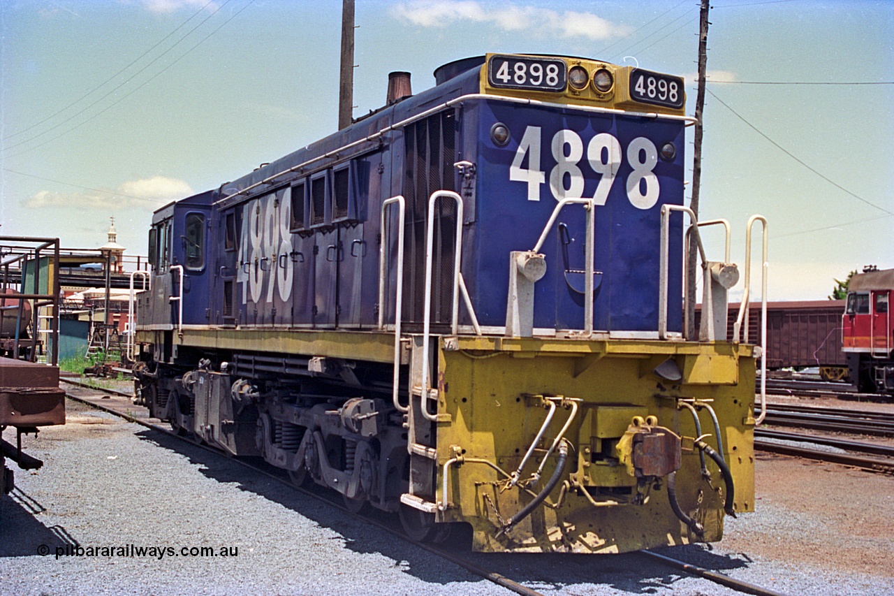 180-22
Albury, NSW, loco depot, NSWSRA standard gauge 48 class locomotive 4898 AE Goodwin ALCo model DL531 serial G3420-13 wearing Freight Rail livery rests near the fuel points.
Keywords: 48-class;4898;AE-Goodwin;ALCo;DL531;G3420-13;