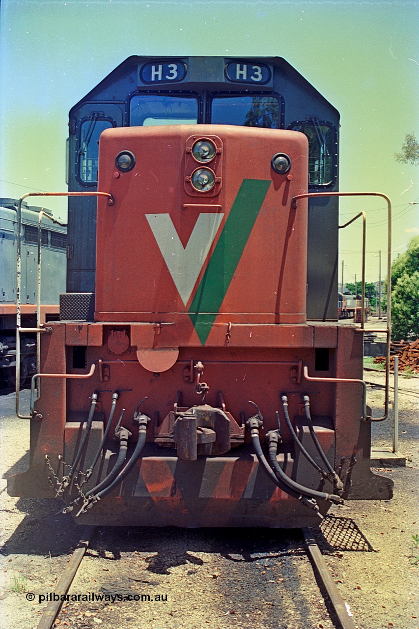 180-34
Wodonga turntable radial roads finds V/Line broad gauge H class loco H 3 Clyde Engineering EMD model G18B serial 68-631 resting between jobs, cab front view.
Keywords: H-class;H3;Clyde-Engineering-Granville-NSW;EMD;G18B;68-631;