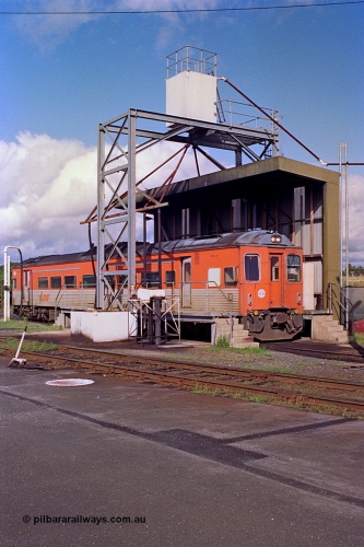 180-05
Seymour loco depot, fuel and sanding point, V/Line broad gauge Tulloch Ltd built DRC class diesel railcar DRC 40 takes on fuel having run a down Saturday morning passenger train from Melbourne.
Keywords: DRC-class;DRC40;Tulloch-Ltd-NSW;
