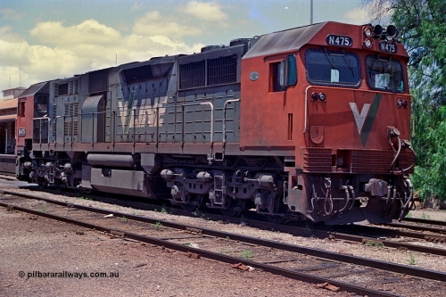 180-36
Wodonga, the last member of V/Line broad gauge N class locomotives N 475 'City of Moe' Clyde Engineering EMD model JT22HC-2 serial 87-1204 stands near the signal box shut down having bought the morning down passenger service from Melbourne.
Keywords: N-class;N475;Clyde-Engineering-Somerton-Victoria;EMD;JT22HC-2;87-1204;