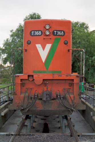 183-14
Seymour loco depot, V/Line broad gauge loco T class T 368 Clyde Engineering EMD model G8B serial 64-323 sits over the brake pit, front view.
Keywords: T-class;T368;Clyde-Engineering-Granville-NSW;EMD;G8B;64-323;