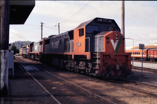 183-20
Wodonga loco depot fuel point, V/Line broad gauge X class locos X 46 Clyde Engineering EMD model G26C serial 75-793, X 45 'Edgar H Brownbill' serial 75-792 and B class B 75 Clyde Engineering EMD model ML2 serial ML2-16 which still wears the Victorian Railways livery await their next turn of duty, the station is to the right.
Keywords: X-class;X46;Clyde-Engineering-Rosewater-SA;EMD;G26C;75-793;