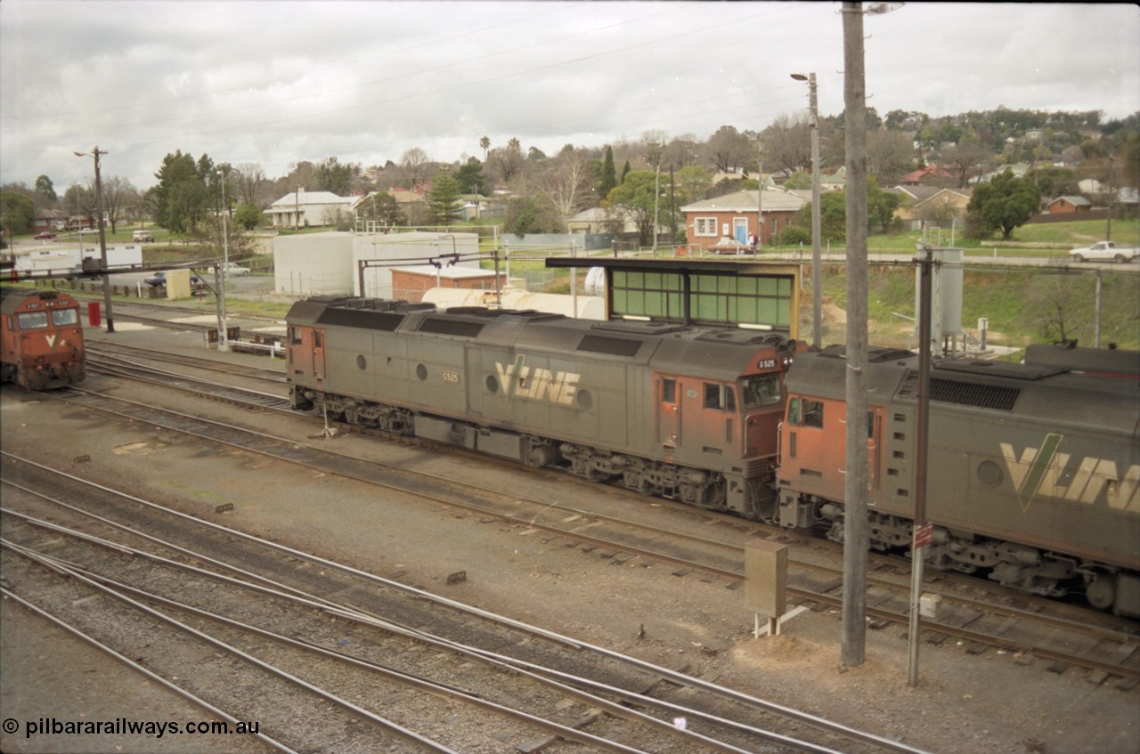 184-24
Albury loco depot, V/Line standard gauge G class G 520 Clyde Engineering EMD model JT26C-2SS serial 85-1233 receives attention at the fuel point, elevated view.
Keywords: G-class;G525;Clyde-Engineering-Rosewater-SA;EMD;JT26C-2SS;86-1238;