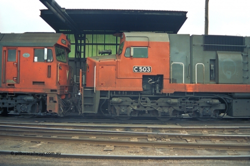 184-14
Albury loco depot fuel point, standard gauge V/Line C class loco C 503 Clyde Engineering EMD model GT26C serial 76-826, cab side view, detail of bogie and staff exchanger, coupled to G class G 527 Clyde Engineering EMD model JT26C-2SS serial 88-1257.
Keywords: C-class;C503;Clyde-Engineering-Rosewater-SA;EMD;GT26C;76-826;G-class;G527;JT26C-2SS;88-1257;