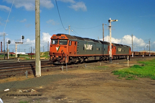 185-14
North Geelong Yard, V/Line light engines, G classes G 534 Clyde Engineering EMD model JT26C-2SS serial 88-1264 leads older sister and class leader G 511 serial 84-1239 as they run from North Geelong B Box past semaphore signal post 17 before shunting back into the sorting roads, the Loop Line to Melbourne and the Grain Loop roads can be seen to the left of the loco.
Keywords: G-class;G534;Clyde-Engineering-Somerton-Victoria;EMD;JT26C-2SS;88-1264;