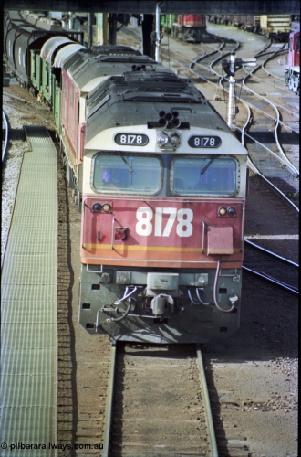 189-28
Albury yard view, double NSWSRA 81 class locomotives 8178 Clyde Engineering EMD model JT26C-2SS serial 85-1097 and 8170 wearing the candy livery on the point of an Victorian bound goods train, cab front vertical view.
Keywords: 81-class;8178;Clyde-Engineering-Kelso-NSW;EMD;JT26C-2SS;85-1097;