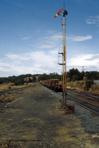 191-19
Kilmore East station environs, looking south, Signal Post 5 Up Home, UP special sleeper discharge train heading south with Signal Post 2 Up Starting visible in the distance, Down Refuge Siding on the right with Signal Post 4.
