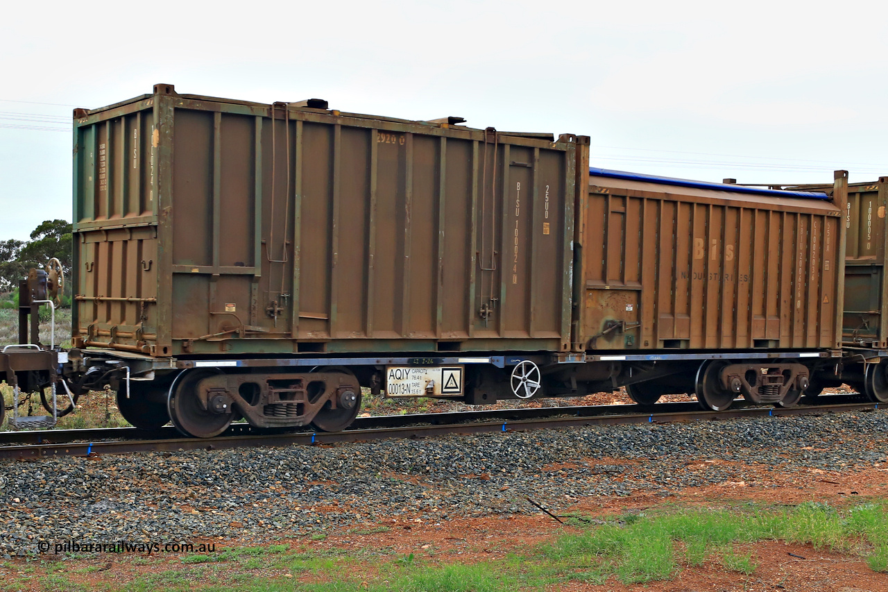240401 4991
Kalgoorlie, Aurizon's 1029 Malcolm Freighter, waggon AQIY 00013 loaded with two 20' sulphur containers, a 25U0 hard top BISU 100024 [0] and a 55UA roll top Bis Industries SBIU 200636 [0]. The AQIY started life built by Bradken and coded CQYY but CFCLA never bought them, so Bradken coded them KQYY and stored them. When Aurizon bought them they had the handbrake relocated to the middle of the waggon from the end. 1st of April 2024.
Keywords: AQIY-type;AQIY00013;Bradken;CQYY-type;KQYY-type;