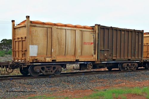 240401 4980
Kalgoorlie, Aurizon's 1029 Malcolm Freighter, waggon AQIY 00009 loaded with two 20' sulphur containers, a 25UA type roll top Bis Deliver Every Day BICN 107000[7] and a 25U0 hard top BISU 100041[9]. The AQIY were originally built as the CQYY but CFCLA did not buy them, Bradken then stored them as KQYY. When Aurizon bought them they had the handbrake relocated to the middle of the waggon from the end. 1st of April 2024.
Keywords: AQIY-type;AQIY00009;Bradken;CQYY-type;KQYY-type;
