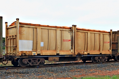240401 4984
Kalgoorlie, Aurizon's 1029 Malcolm Freighter, waggon AQIY type leader AQIY 00001 loaded with two 20' 25UA type roll tops, Bis Deliver Every Day BICN 107800[8] and BICN 106100[5]. The AQIY were originally built as the CQYY but CFCLA did not buy them, Bradken then stored them as KQYY. When Aurizon bought them they had the handbrake relocated to the middle of the waggon from the end. 1st of April 2024.
Keywords: AQIY-type;AQIY00001;Bradken;CQYY-type;KQYY-type;