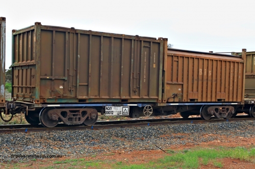 240401 4993
Kalgoorlie, Aurizon's 1029 Malcolm Freighter, waggon AQIY 00012 loaded with two 20' sulphur containers, a 25U0 hard top BISU 100029[7] and a 55UA roll top Bis Industries SBIU 200620[4]. The AQIY were originally built as the CQYY but CFCLA did not buy them, Bradken then stored them as KQYY. When Aurizon bought them they had the handbrake relocated to the middle of the waggon from the end. 1st of April 2024.
Keywords: AQIY-type;AQIY00012;Bradken;CQYY-type;KQYY-type;