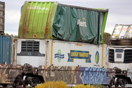 260901 7680
RRRY 7005 platform #2 with damaged top box. Was part of train 1MP5 which was backed up the Esperance line and struck Lefroy Bridge, August 31, 2026.
P2T SLCS 400128 [9] 4FSG curtain sider Sadliers
P2B LTCD 462409 RFRG Lindsay Transport reefer
Keywords: Peter-D-Image;RRRY-type;RRRY7003;1PM5