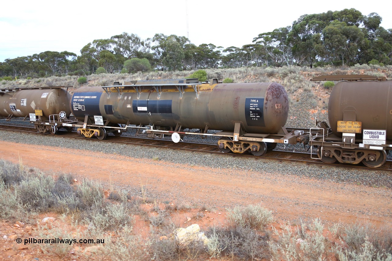 161116 5120
West Kalgoorlie, Shell fuel train 3442, tank waggon NTAY 6128, built by Indeng Qld 1976 for Shell as type SCA 279, then NTAF 279 with normal couplers.
Keywords: NTAY-type;NTAY6128;Indeng-Qld;SCA-type;SCA279;NTAF-type;