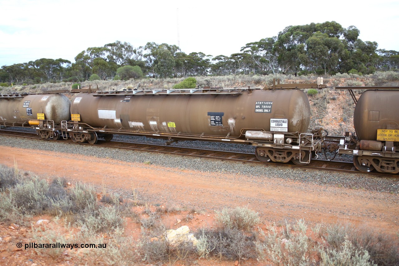 161116 5122
West Kalgoorlie, Shell fuel train 3442, tank waggon ATBY 14594, built by Westrail Midland Workshops 1981 for Bain Leasing as narrow gauge type JPB, to SG as WPJB then WJBY, 82 kL one compartment one dome, fitted with type F InterLock couplers, vacuum brake pipe, Shell Fleet no. TR728.
Keywords: ATBY-type;ATBY14594;Westrail-Midland-WS;JPB-type;JPBA-type;WJPB-type;
