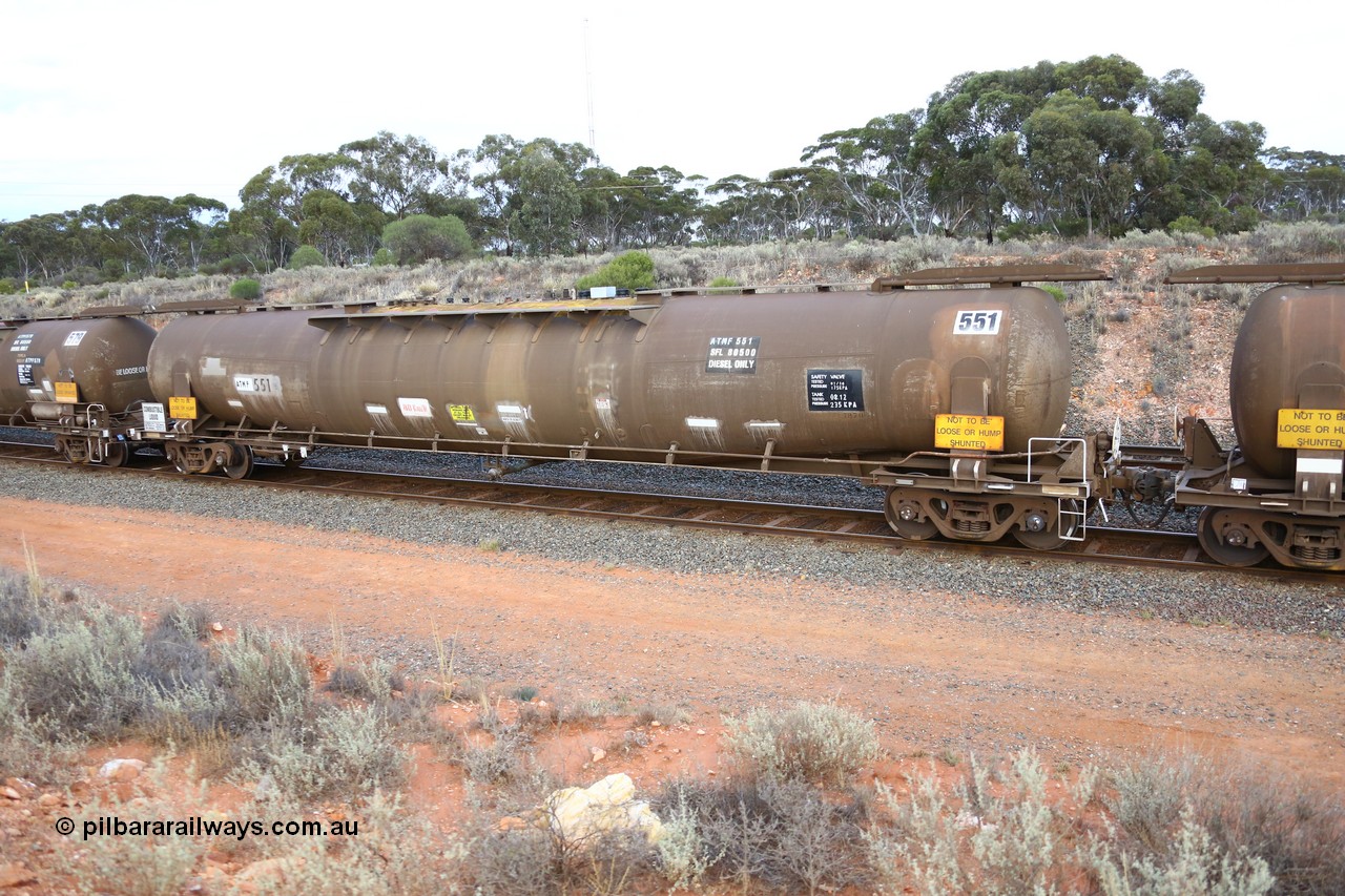 161116 5125
West Kalgoorlie, Shell fuel train 3442, ATMF 551 fuel tank waggon, one of three built by Tulloch Limited NSW as WJM type in 1971 with a capacity of 96.25 kL one compartment one dome, current capacity of 80500 litres. 551 and 552 for Shell and 553 for BP Oil. Fitted with type F InterLock coupler handbrake end and E type at the non-handbrake end.
Keywords: ATMF-type;ATMF551;Tulloch-Ltd-NSW;WJM-type;