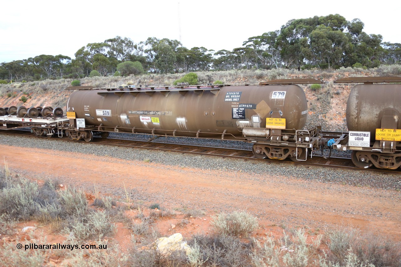 161116 5126
West Kalgoorlie, Shell fuel train 3442, ATPF 579 fuel tank waggon built by WAGR Midland Workshops 1974 for Shell as WJP type 80.66 kL one compartment one dome, fitted with type F InterLock couplers.
Keywords: ATPF-type;ATPF579;WAGR-Midland-WS;WJP-type;