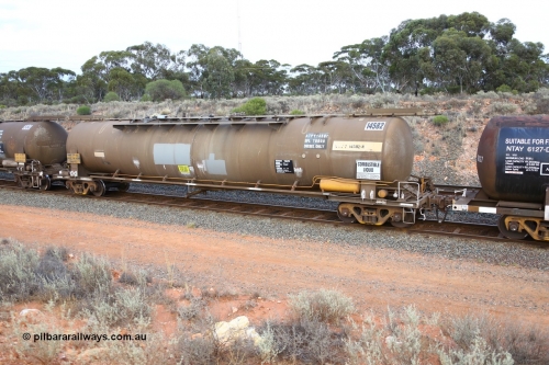 161116 5118
West Kalgoorlie, Shell fuel train 3442, tank waggon ATPY 14582, built by Westrail Midland Workshops 1976 as narrow gauge type JPA, one of eight, in 1985 recoded to JPAA and then WJPA on SG. Fitted with type F InterLock couplers.
Keywords: ATBY-type;ATBY14582;Westrail-Midland-WS;JPA-type;JPAA-type;WJPA-type;