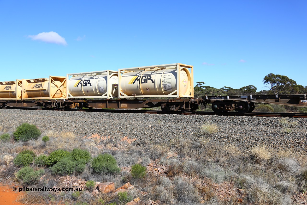 161111 2504
Binduli, Kalgoorlie Freighter train 5025, waggon AQNY 32157 one of sixty two waggons built by Goninan WA in 1998 as WQN type for Murrin Murrin container traffic, carrying two AGR 20' 22K2 type Eurotainer tanktainers EURU 112065 and EURU 112053 containing sodium cyanide solution.
Keywords: AQNY-type;AQNY32157;Goninan-WA;WQN-type;