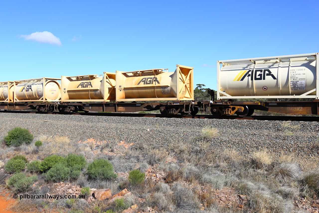 161111 2505
Binduli, Kalgoorlie Freighter train 5025, waggon AQNY 32182 one of sixty two waggons built by Goninan WA in 1998 as WQN type for Murrin Murrin container traffic, carrying two AGR 20' tanktainers V0687 and V0688 containing sodium cyanide solution.
Keywords: AQNY-type;AQNY32182;Goninan-WA;WQN-type;