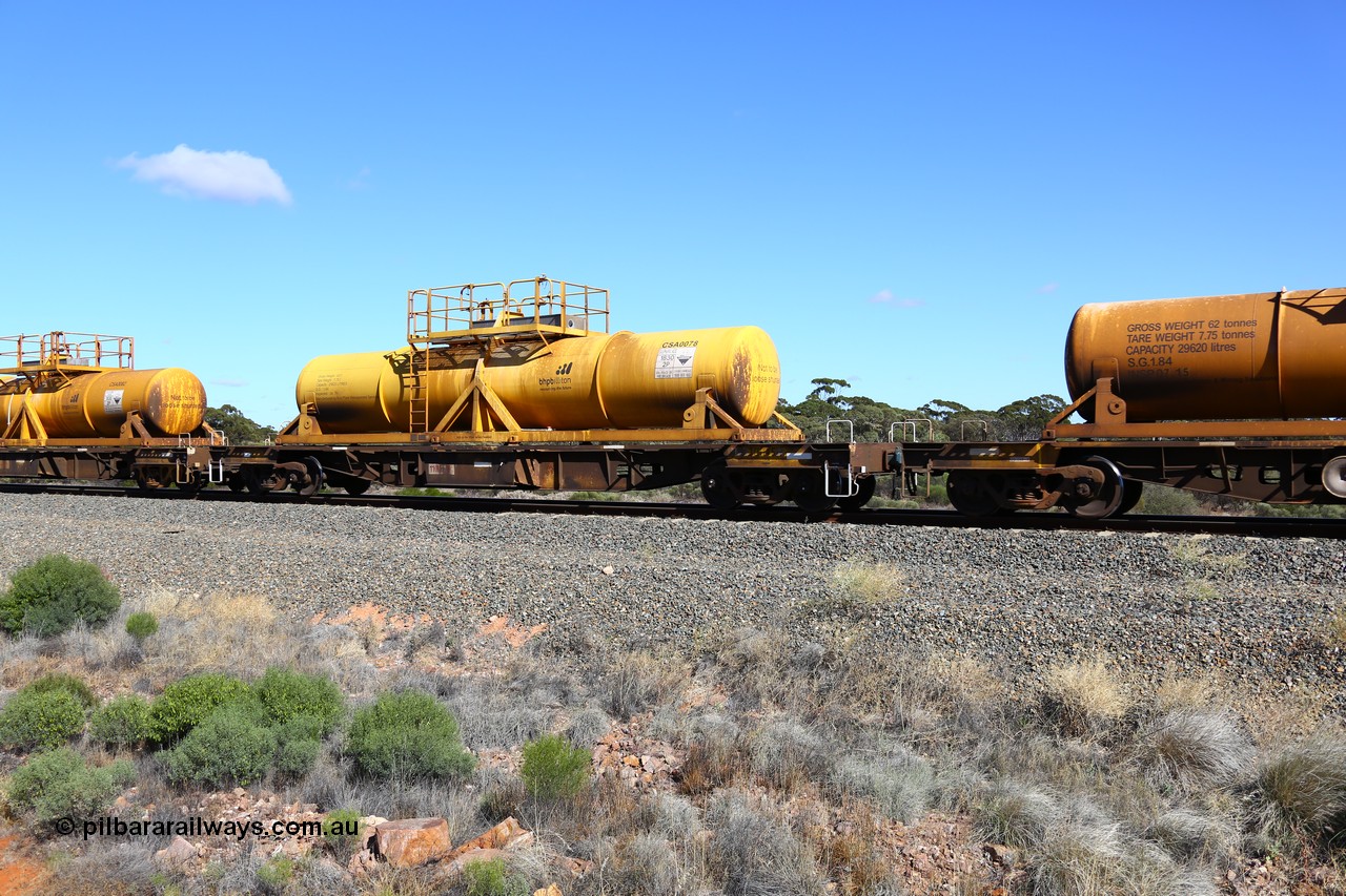 161111 2525
Binduli, Kalgoorlie Freighter train 5025, waggon AQHY 30045 with sulphuric acid tank CSA 0078, originally built by the WAGR Midland Workshops in 1964/66 as a WF type flat waggon, then in 1997, following several recodes and modifications, was one of seventy five waggons converted to the WQH type to carry CSA sulphuric acid tanks between Hampton/Kalgoorlie and Perth/Kwinana.
Keywords: AQHY-type;AQHY30045;WAGR-Midland-WS;WF-type;WFDY-type;WFDF-type;RFDF-type;WQH-type;