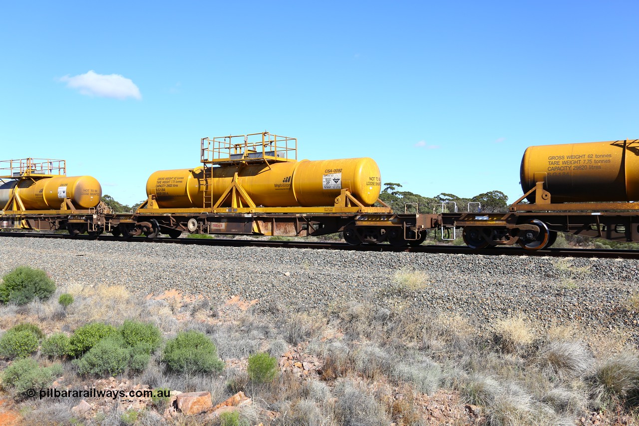 161111 2528
Binduli, Kalgoorlie Freighter train 5025, waggon AQHY 30090 with sulphuric acid tank CSA 0092, originally built by the WAGR Midland Workshops in 1964/66 as a WF type flat waggon, then in 1997, following several recodes and modifications, was one of seventy five waggons converted to the WQH type to carry CSA sulphuric acid tanks between Hampton/Kalgoorlie and Perth/Kwinana.
Keywords: AQHY-type;AQHY30090;WAGR-Midland-WS;WF-type;WFDY-type;WFDF-type;RFDF-type;WQH-type;