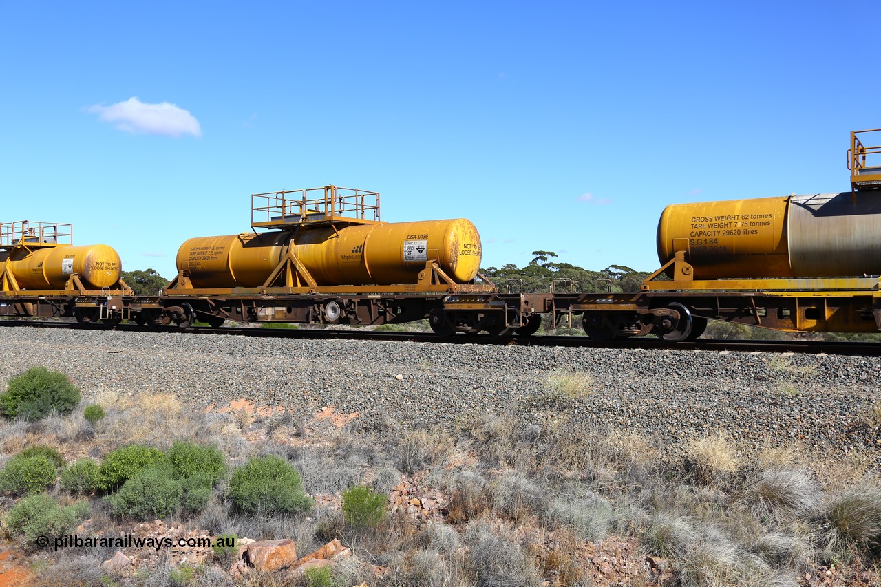 161111 2530
Binduli, Kalgoorlie Freighter train 5025, waggon AQHY 30034 with sulphuric acid tank CSA 0136, originally built by the WAGR Midland Workshops in 1964/66 as a WF type flat waggon, then in 1997, following several recodes and modifications, was one of seventy five waggons converted to the WQH type to carry CSA sulphuric acid tanks between Hampton/Kalgoorlie and Perth/Kwinana.
Keywords: AQHY-type;AQHY30034;WAGR-Midland-WS;WF-type;WFDY-type;WFDF-type;RFDF-type;WQH-type;