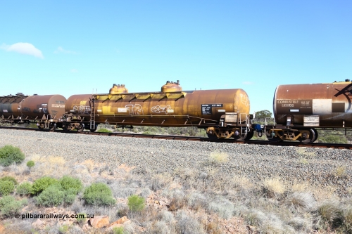 161111 2471
Binduli, Kalgoorlie Freighter train 5025, diesel fuel tank waggon ATTY 30673, one of five built by AE Goodwin NSW in 1970 as WST class, recoded to WSTY and then ATTY. 78600 litre capacity.
Keywords: ATTY-type;ATTY30673;AE-Goodwin;WST-type;WSTY-type;