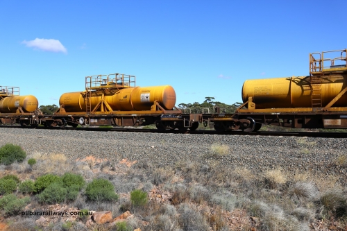 161111 2520
Binduli, Kalgoorlie Freighter train 5025, waggon AQHY 30060 with sulphuric acid tank CSA 0084, originally built by the WAGR Midland Workshops in 1964/66 as a WF type flat waggon, then in 1997, following several recodes and modifications, was one of seventy five waggons converted to the WQH type to carry CSA sulphuric acid tanks between Hampton/Kalgoorlie and Perth/Kwinana.
Keywords: AQHY-type;AQHY30060;WAGR-Midland-WS;WF-type;WFL-type;WFDY-type;WFDF-type;RFDF-type;WQH-type;