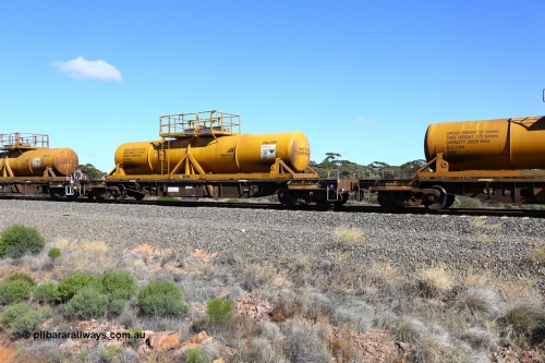 161111 2531
Binduli, Kalgoorlie Freighter train 5025, waggon AQHY 30094 with sulphuric acid tank CSA 0100, originally built by the WAGR Midland Workshops in 1964/66 as a WF type flat waggon, then in 1997, following several recodes and modifications, was one of seventy five waggons converted to the WQH type to carry CSA sulphuric acid tanks between Hampton/Kalgoorlie and Perth/Kwinana.
Keywords: AQHY-type;AQHY30094;WAGR-Midland-WS;WF-type;WFDY-type;WFDF-type;RFDF-type;WQH-type;