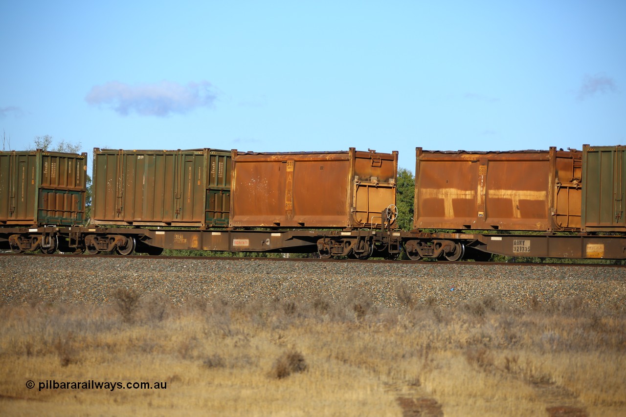 161111 2408
Kalgoorlie, Malcolm freighter train 5029, waggon AQNY 32172 one of sixty two waggons built by Goninan WA in 1998 as WQN type for Murrin Murrin container traffic with an original style sulphur container S11N 911 with original style door and sliding tarpaulin and a Bis Industries hard-top 25U0 type sulphur container BISU 100063.
Keywords: AQNY-type;AQNY32172;Goninan-WA;WQN-type;