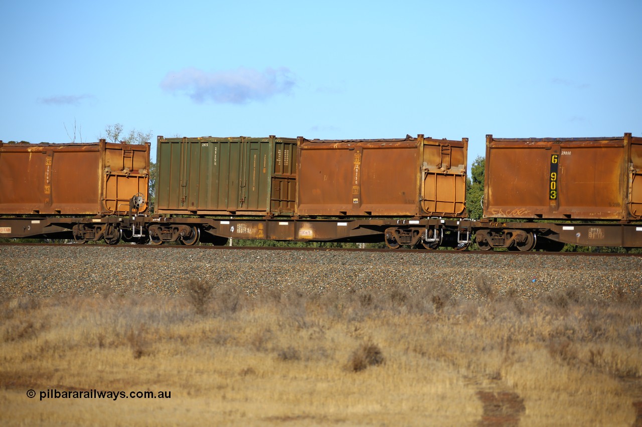161111 2411
Kalgoorlie, Malcolm freighter train 5029, waggon AQNY 32168 one of sixty two waggons built by Goninan WA in 1998 as WQN type for Murrin Murrin container traffic with an original style sulphur container S52X 879 with original style door and sliding tarpaulin and an undecorated Bis Industries hard-top 25U0 type sulphur container BISU 100011.
Keywords: AQNY-type;AQNY32168;Goninan-WA;WQN-type;