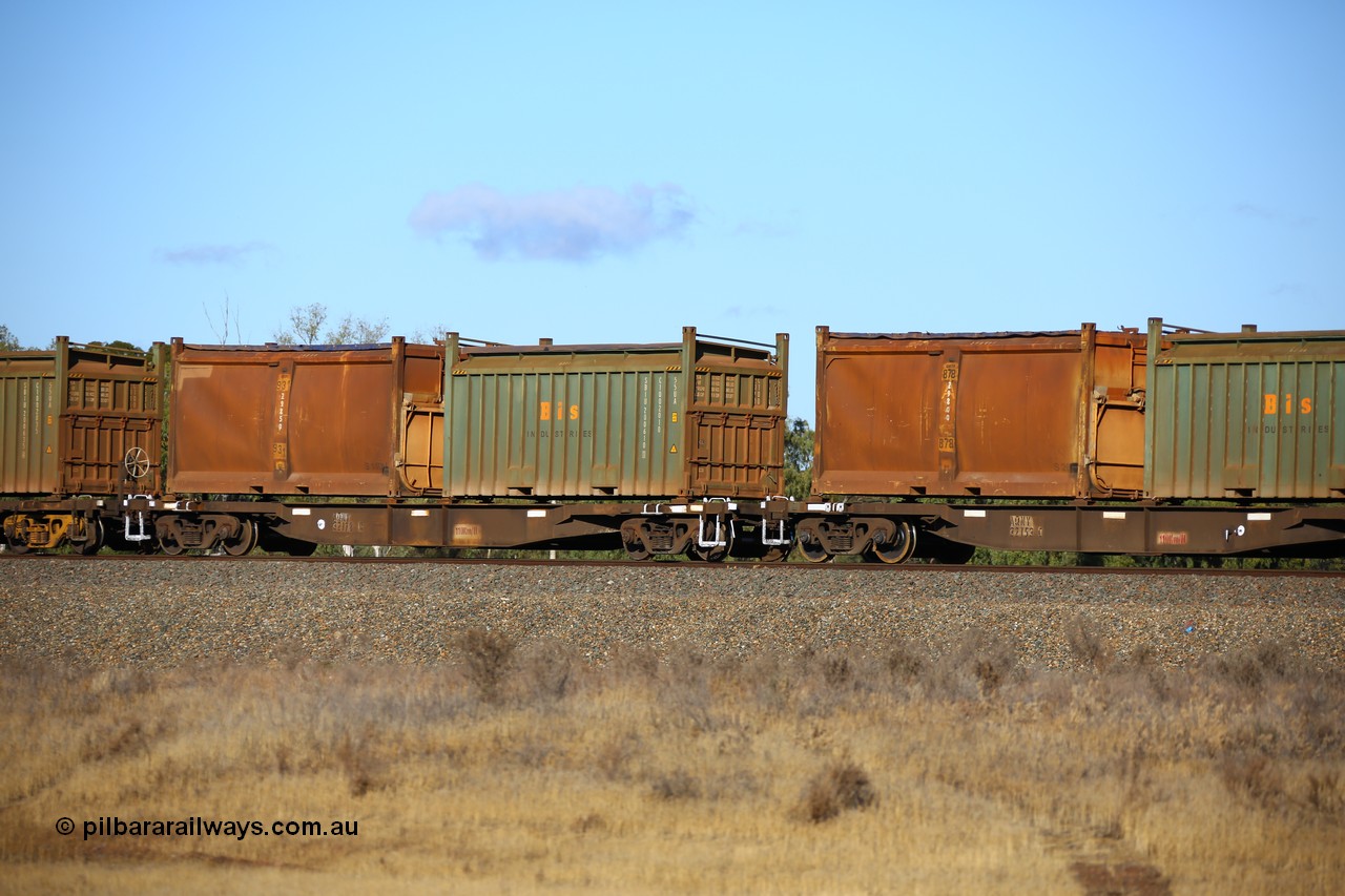 161111 2414
Kalgoorlie, Malcolm freighter train 5029, waggon AQNY 32178 one of sixty two waggons built by Goninan WA in 1998 as WQN type for Murrin Murrin container traffic with a Bis Industries roll-top 55UA type sulphur container 200610 and an original style sulphur container S140M 931 with sliding tarpaulin roof and replacement door.
Keywords: AQNY-type;AQNY32178;Goninan-WA;WQN-type;