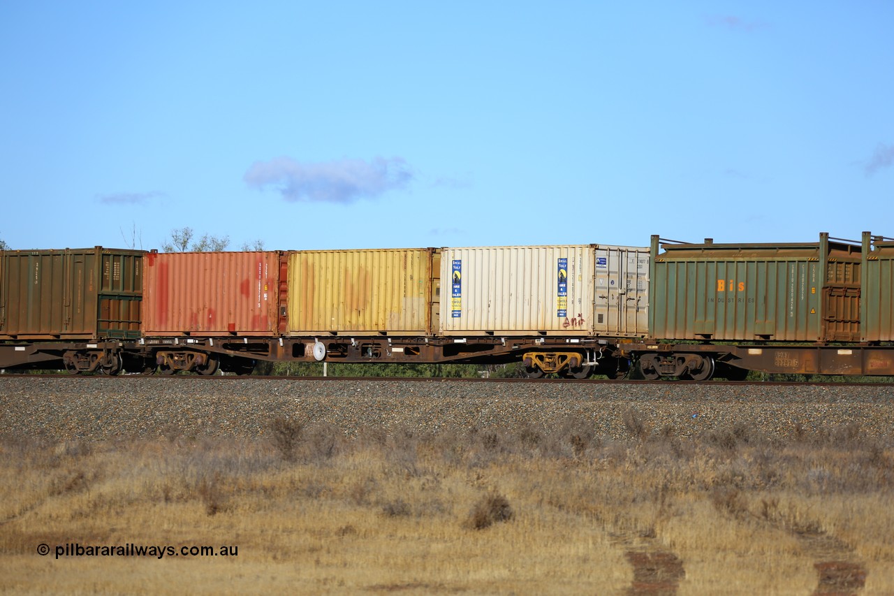 161111 2416
Kalgoorlie, Malcolm freighter train 5029, waggon AQWY 31004, one of eighteen WFA type container waggons built by Westrail Midland Workshops in 1981, carrying three 20' 22G1 type containers, RWLU 214077, RSSU 128484 and XXXU 209747.
Keywords: AQWY-type;AQWY31004;Westrail-Midland-WS;WFA-type;