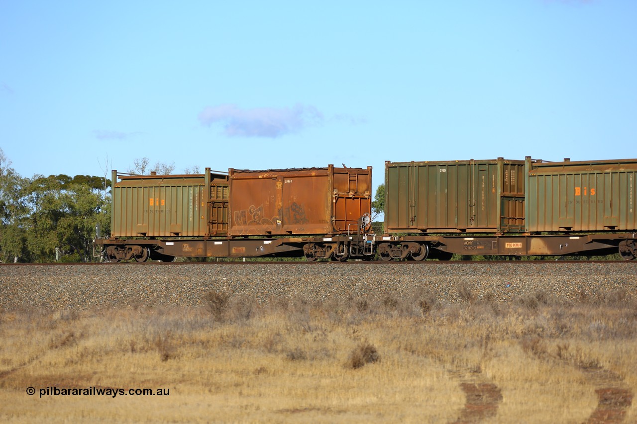 161111 2429
Kalgoorlie, Malcolm freighter train 5029, waggon AQNY 32204 one of sixty two waggons built by Goninan WA in 1998 as WQN type for Murrin Murrin container traffic with an original style sulphur container S77A 954 with original style door and sliding tarpaulin and a Bis Industries roll-top 55UA type sulphur container SBIU 200600.
Keywords: AQNY-type;AQNY32204;Goninan-WA;WQN-type;