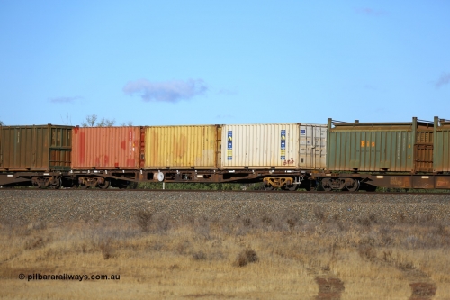 161111 2416
Kalgoorlie, Malcolm freighter train 5029, waggon AQWY 31004, one of eighteen WFA type container waggons built by Westrail Midland Workshops in 1981, carrying three 20' 22G1 type containers, RWLU 214077, RSSU 128484 and XXXU 209747.
Keywords: AQWY-type;AQWY31004;Westrail-Midland-WS;WFA-type;