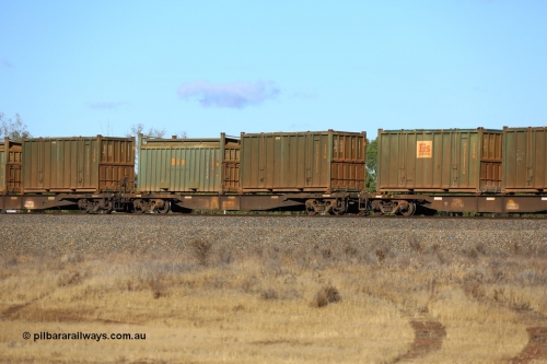 161111 2418
Kalgoorlie, Malcolm freighter train 5029, waggon AQNY 32193 one of sixty two waggons built by Goninan WA in 1998 as WQN type for Murrin Murrin container traffic with an undecorated Bis Industries hard-top 25U0 type sulphur container BISU 100013 and a Bis Industries roll-top 55UA type sulphur container SBIU 200634.
Keywords: AQNY-type;AQNY32193;Goninan-WA;WQN-type;
