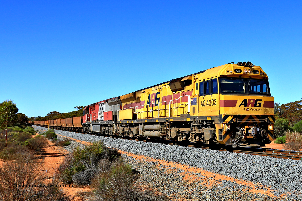 240328 2794
Hampton, Aurizon operated Mineral Resources empty Mount Walton iron ore train #5040 is powered by AC class locomotive AC 4303 and sill in original ARG livery. AC 4303 with serial number R0006-04 / 09-374 in a GE C43ACi model built by UGL Rail NSW in 2009 in an order for eight AC class units placed by QRN/ARG. Seen here on the 28th of March 2024.
Keywords: AC-class;AC4303;UGL-Rail-NSW;GE;C43ACi;R0006-04/09-374;