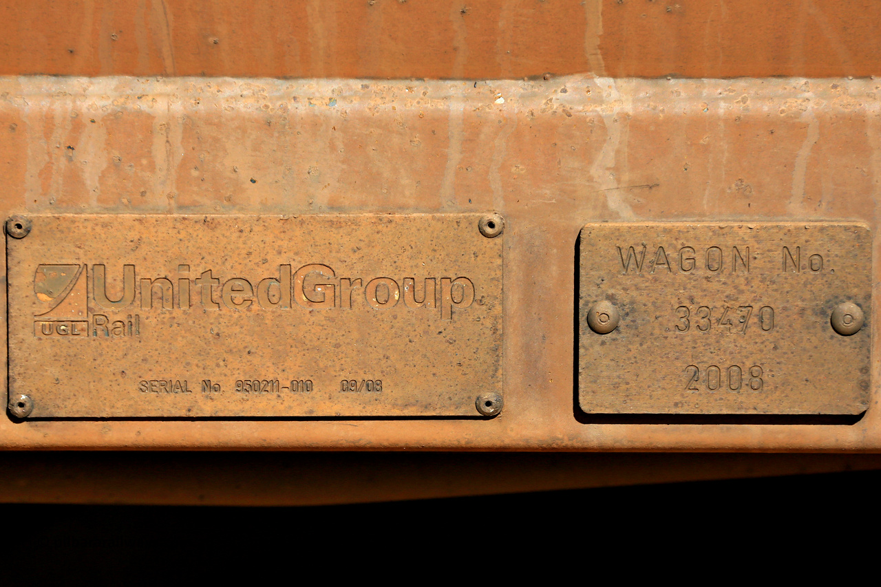 240328 2885
Builders plate for WOE type iron ore waggon WOE 33470 which is one of a batch of one hundred and twenty eight built by United Group Rail WA between August 2008 and March 2009 with serial number 950211-012 and fleet number 8970, in Mineral Resources traffic 5040 empty Mount Walton iron ore train. 28th March 2024.
Keywords: WOE-type;WOE33470;United-Group-Rail-WA;950211-012;