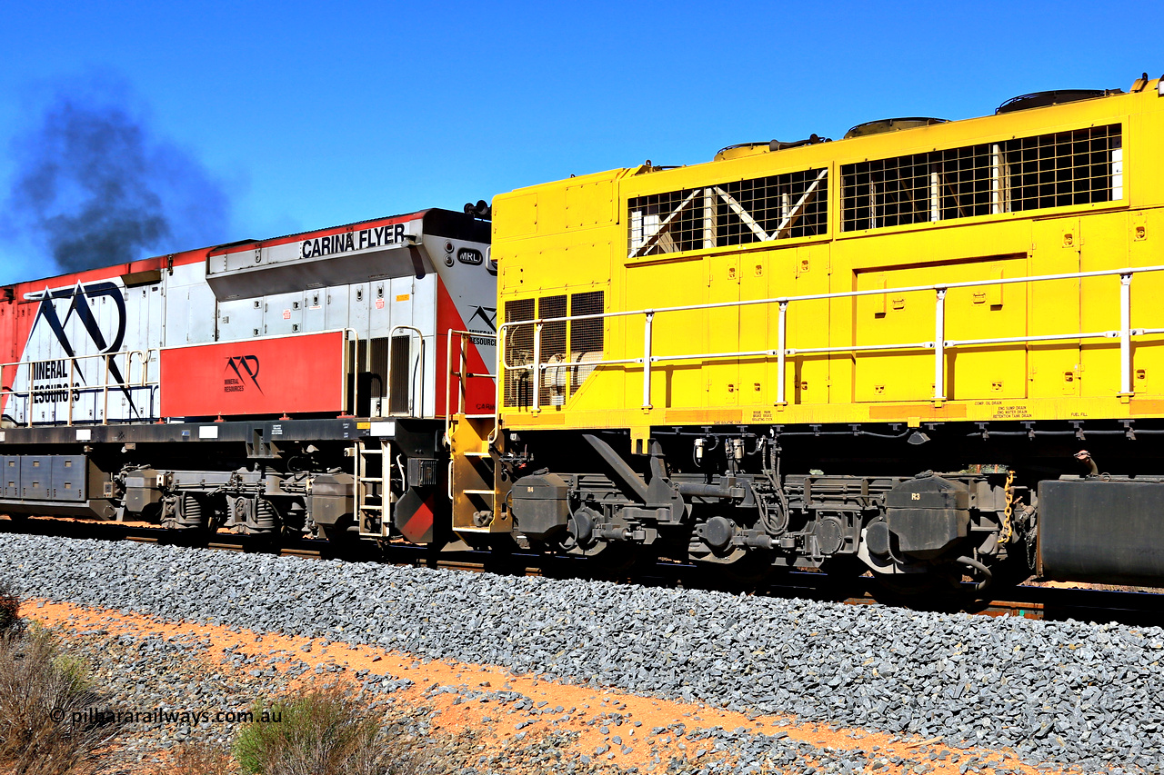 240328 2906
Feysville, Mineral Resources empty Mount Walton iron ore train 5040 with mid-train units Q 4003 and MRL 005 'Carina Flyer' view of the differing radiator sections on the EMD GT46C [Q 4003] and the GE C44ACi [MRL 005]. 28th March 2024.
Keywords: Q-class;Q4003;Clyde-Engineering-Forrestfield-WA;EMD;GT46C;97-1456;Q303;