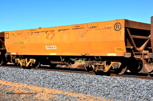 240328 2837
WOE type iron ore waggon WOE 31128 is one of a batch of one hundred and thirty built by Goninan WA between March and August 2001 with serial number 950092-118 and was fleet number 710 before the Aurizon yellow painted sides and logo, in Mineral Resources traffic 5040 empty Mount Walton iron ore train. March 28, 2024.
Keywords: WOE-type;WOE31128;Goninan-WA;950092-118;