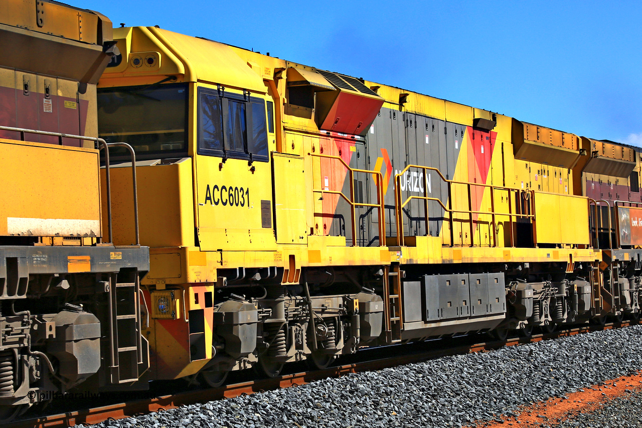 240328 2970
Loaded Koolyanobbing iron ore train 5041 runs south at Hampton with Aurizon's ACC class loco ACC 6031 with serial number R-0093-01 / 13-485 a UGL Rail built GE C44ACi model in the Aurizon livery bookended by two AC class units as loaded iron ore train 5041 with 126 waggons of MHLY and MHPY types. 28th of March 2024.
Keywords: ACC-class;ACC6031;UGL-Rail-NSW;GE;C44ACi;R-0093-01/13-485;