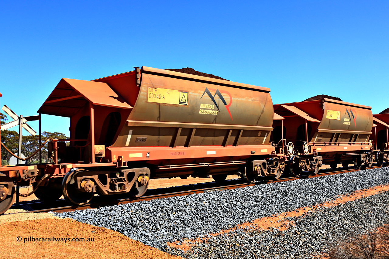 240328 2976
Loaded Koolyanobbing iron ore train 5041 with Mineral Resources Ltd MHPY type iron ore waggons MHPY 00340 and MHPY 00339 built by CSR Yangtze Co China with serial numbers 2014 / 382-340 and 2014 / 382-339 in 2014 as a batch of 382 pairs, these bottom discharge hopper waggons are operated in 'married' pairs. 28th of March 2024.
Keywords: MHPY-type;MHPY00340;2014/382-340;MHPY00339;2014/382-339;CSR-Yangtze-Rolling-Stock-Co-China;
