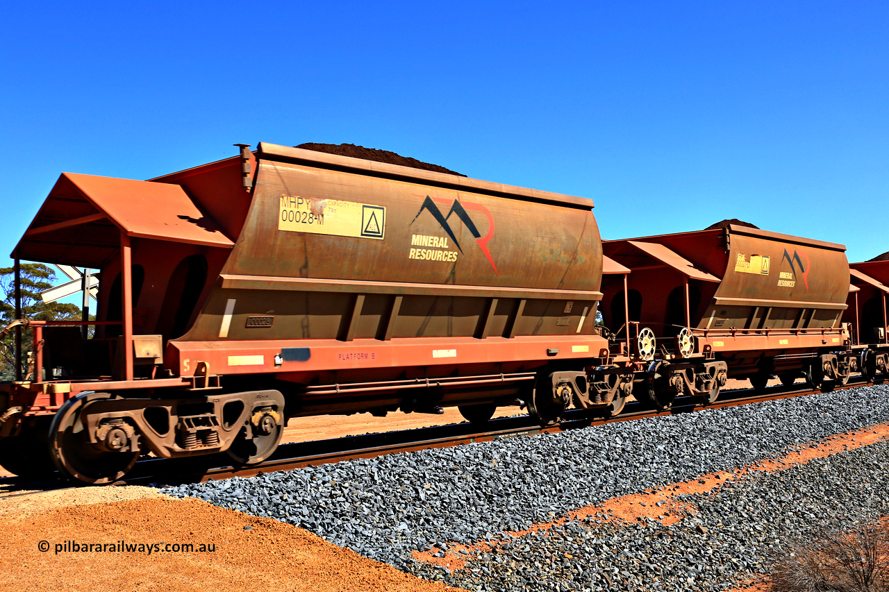 240328 2977
Loaded Koolyanobbing iron ore train 5041 with Mineral Resources Ltd MHPY type iron ore waggons MHPY 00028 and MHPY 00027 built by CSR Yangtze Co China with serial numbers 2014 / 382-28 and 2014 / 382-27 in 2014 as a batch of 382 pairs, these bottom discharge hopper waggons are operated in 'married' pairs. 28th of March 2024.
Keywords: MHPY-type;MHPY00028;2014/382-28;MHPY00027;2014/382-27;CSR-Yangtze-Rolling-Stock-Co-China;