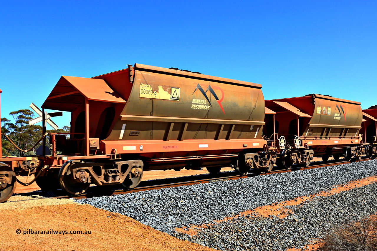 240328 2980
Loaded Koolyanobbing iron ore train 5041 with Mineral Resources Ltd MHPY type iron ore waggons MHPY 00060 and MHPY 00059 built by CSR Yangtze Co China with serial numbers 2014 / 382-60 and 2014 / 382-59 in 2014 as a batch of 382 pairs, these bottom discharge hopper waggons are operated in 'married' pairs. 28th of March 2024.
Keywords: MHPY-type;MHPY00060;2014/382-60;MHPY00059;2014/382-59;CSR-Yangtze-Rolling-Stock-Co-China;