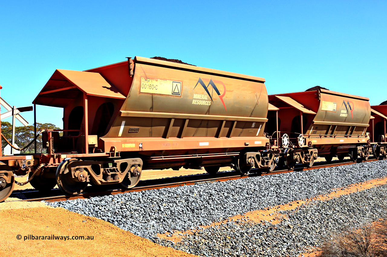 240328 3002
Loaded Koolyanobbing iron ore train 5041 with Mineral Resources Ltd MHPY type iron ore waggons MHPY 00160 and MHPY 00159 built by CSR Yangtze Co China with serial numbers 2014 / 382-160 and 2014 / 382-159 in 2014 as a batch of 382 pairs, these bottom discharge hopper waggons are operated in 'married' pairs. 28th of March 2024.
Keywords: MHPY-type;MHPY00160;2014/382-160;MHPY00159;2014/382-159;CSR-Yangtze-Rolling-Stock-Co-China;