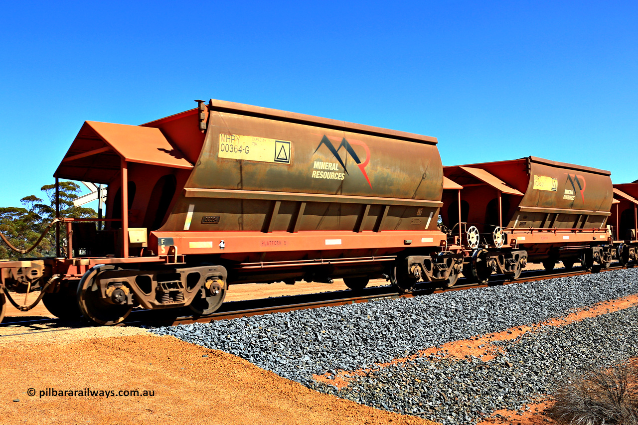 240328 3008
Loaded Koolyanobbing iron ore train 5041 with Mineral Resources Ltd MHPY type iron ore waggons MHPY 00364 and MHPY 00363 built by CSR Yangtze Co China with serial numbers 2014 / 382-364 and 2014 / 382-363 in 2014 as a batch of 382 pairs, these bottom discharge hopper waggons are operated in 'married' pairs. 28th of March 2024.
Keywords: MHPY-type;MHPY00364;2014/382-364;MHPY00363;2014/382-363;CSR-Yangtze-Rolling-Stock-Co-China;