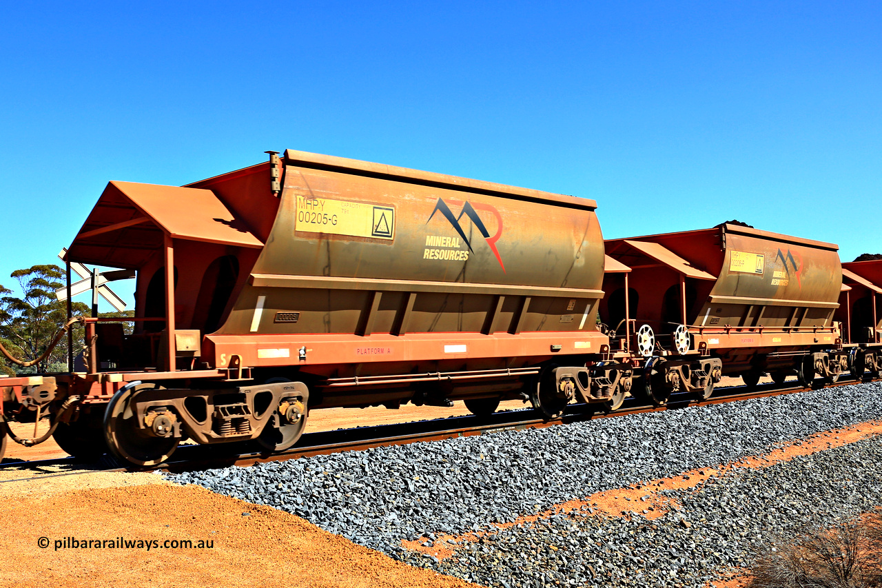 240328 3026
Loaded Koolyanobbing iron ore train 5041 with Mineral Resources Ltd MHPY type iron ore waggons MHPY 00205 and MHPY 00206 built by CSR Yangtze Co China with serial numbers 2014 / 382-205 and 2014 / 382-206 in 2014 as a batch of 382 pairs, these bottom discharge hopper waggons are operated in 'married' pairs. 28th of March 2024.
Keywords: MHPY-type;MHPY00205;2014/382-205;MHPY00206;2014/382-206;CSR-Yangtze-Rolling-Stock-Co-China;