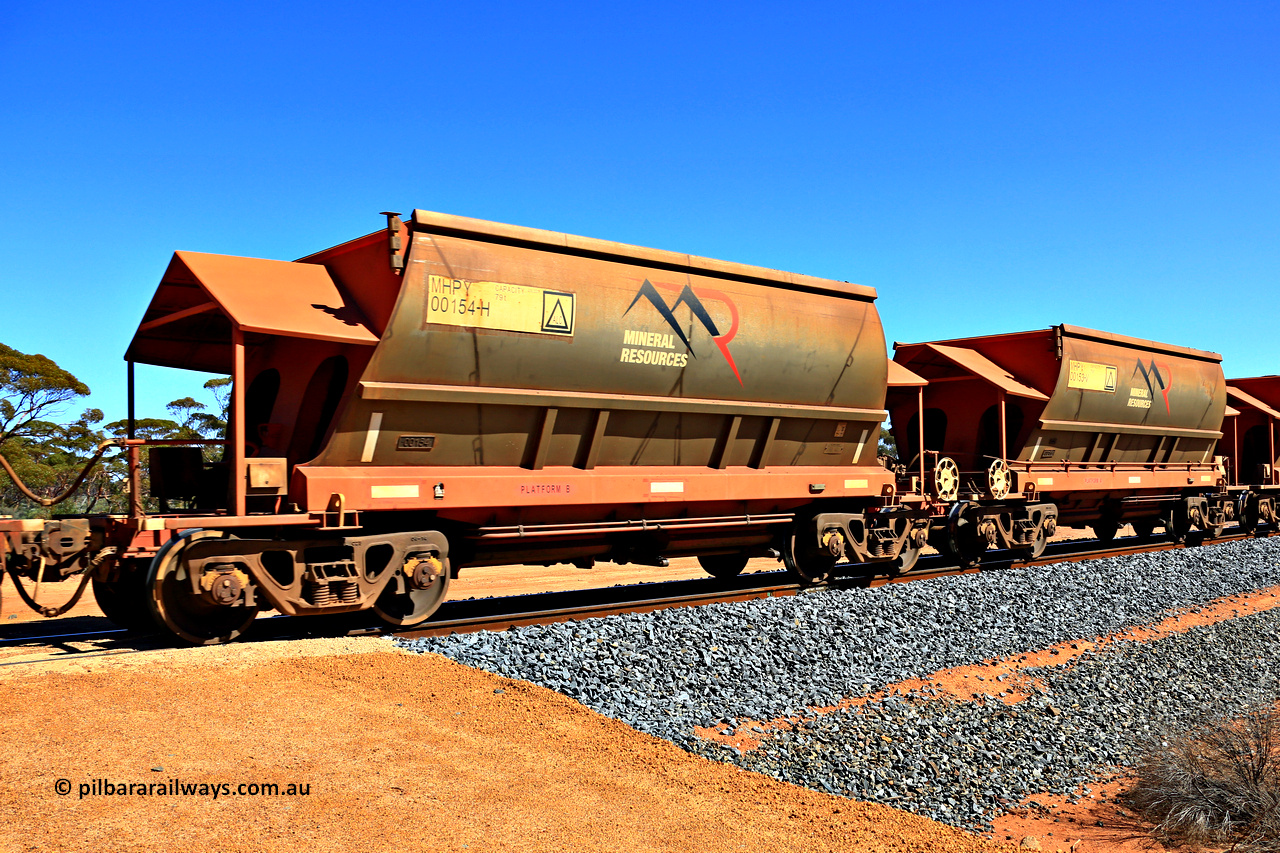 240328 3028
Loaded Koolyanobbing iron ore train 5041 with Mineral Resources Ltd MHPY type iron ore waggons MHPY 00154 and MHPY 00153 built by CSR Yangtze Co China with serial numbers 2014 / 382-154 and 2014 / 382-153 in 2014 as a batch of 382 pairs, these bottom discharge hopper waggons are operated in 'married' pairs. 28th of March 2024.
Keywords: MHPY-type;MHPY00154;2014/382-154;MHPY00153;2014/382-153;CSR-Yangtze-Rolling-Stock-Co-China;