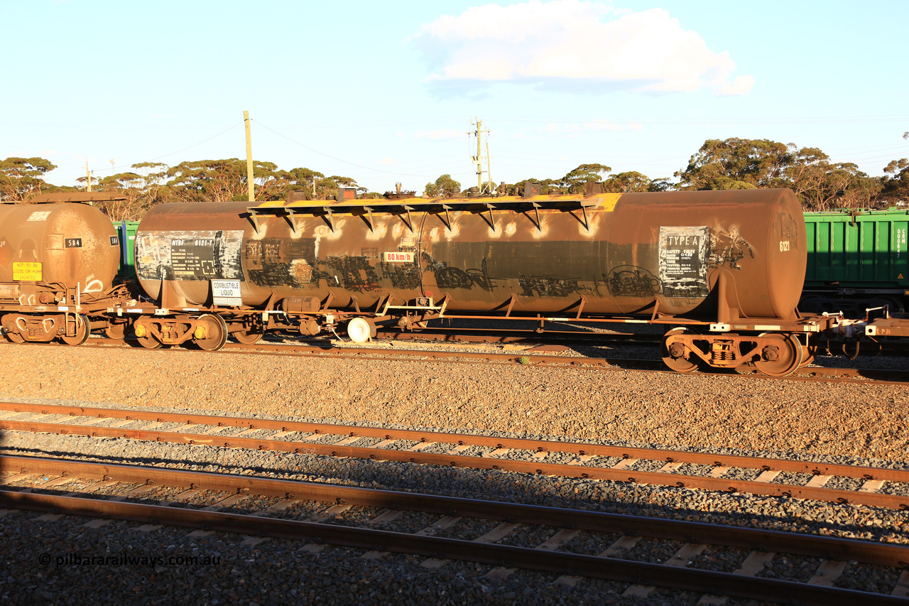 240328 3173
West Kalgoorlie, Viva Energy's NTBF 6121 fuel tank waggon, built by Comeng NSW in 1975 as SCA type SCA 272 for Shell Bitumen, fitted with conventional couplers with a diesel capacity of 62,700 litres, on Pacific National's train 5445 empty fuel to Esperance. March 28, 2024.
Keywords: NTBF-type;NTBF6121;Comeng-NSW;SCA-type;SCA272;NTAF-type;